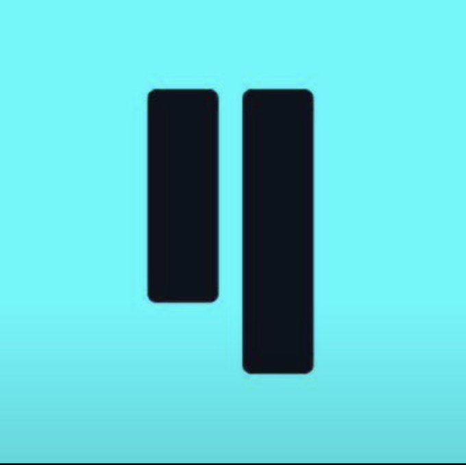 A simple graphic showing two dark gray, vertical rounded rectangles resembling a pause button on a light blue background.