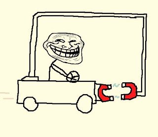 A simple line drawing meme shows the 'Trollface' character driving a small cart that has a magnet on the back, which is attracting a pair of red and white magnetic hooks.