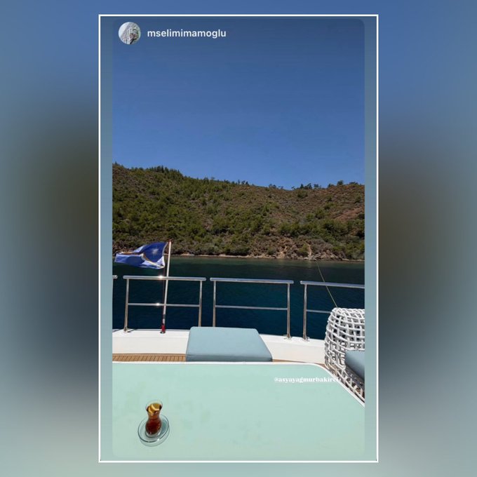 A boat on a sunny day with a flag and a cup of tea, a scene possibly posted by mselimimamoglou to accompany a message about contacting Selim İmamoğlu.