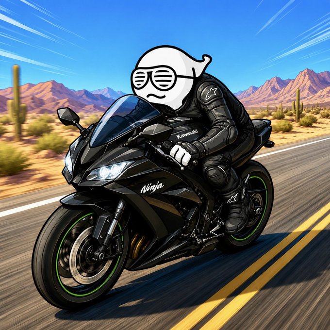 An animated white figure wearing sunglasses rides a black Kawasaki Ninja motorcycle through a desert landscape with cacti and mountains.