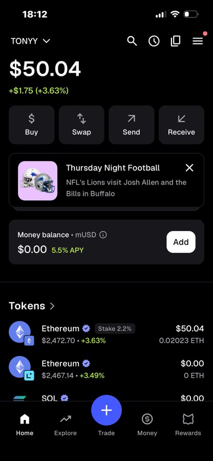 A crypto wallet app screenshot showing a portfolio valued at $50.04 with a +$1.75 (+3.63%) gain, featuring 0.02023 ETH as the main holding, alongside a "Thursday Night Football" promotional banner about the Lions vs. Bills game in Buffalo. The modest portfolio balance contrasts with the bold claim of being "genuine," suggesting the poster is emphasizing authenticity despite their small-scale holdings.
