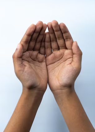 Two open palms facing upward against a pale background, symbolizing scarcity and the desire to hold Bitcoin. The image visually reinforces the post's message that the vast majority of people own virtually no BTC, urging viewers to acquire Bitcoin before it becomes even more scarce.