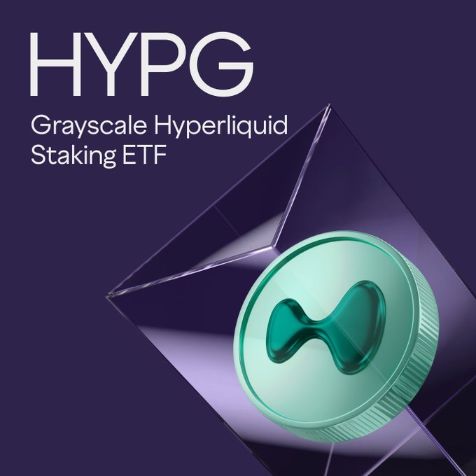 The image features a green coin inside a glass container, with the text "HYPG" written above it. The background of the image is purple, and there are two lines of text below the coin that reads "Grayscale Hyperliquid Staking ETF (Ticker: $HYPG) is now trading - HYPE ETP with the lowest gross management fee in the U.S." This suggests that the coin might be related to cryptocurrency or tokenized assets, possibly a token backed by a fund of funds investing in a diversified portfolio.