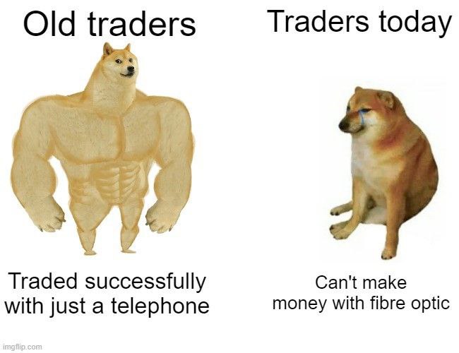 The image is a "Buff Doge vs. Cheems" meme contrasting "Old traders," depicted as a muscular doge captioned "Traded successfully with just a telephone," against "Traders today," shown as a sad Cheems captioned "Can't make money with fibre optic." It humorously reinforces the "Built different" sentiment by suggesting traders of the past were tougher and more skilled with basic tools, while modern traders struggle despite advanced technology.