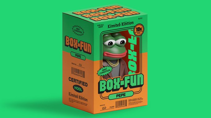 The image features a box for a Peanuts action figure that has been certified as an "E-HOL" collector's edition item. The box is green with white text, and there are two peanuts figurines inside - one of which is wearing a gold chain around its neck.!