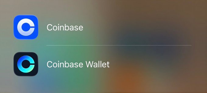 A close-up of a smartphone screen displaying app icons for 'Coinbase' and 'Coinbase Wallet' on a blurred background.