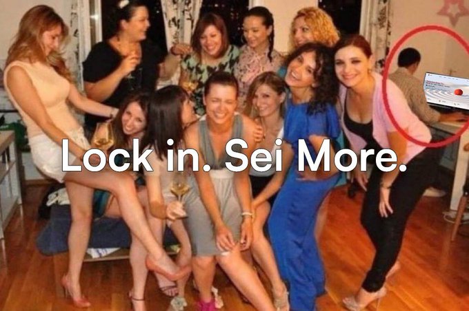 The image shows a group of people standing together, including a woman wearing blue pants and a pink shirt who appears to be posing for a picture. The text "Lock in. Sei more." is written above them, which could be interpreted as a humorous or playful reference to their current situation.