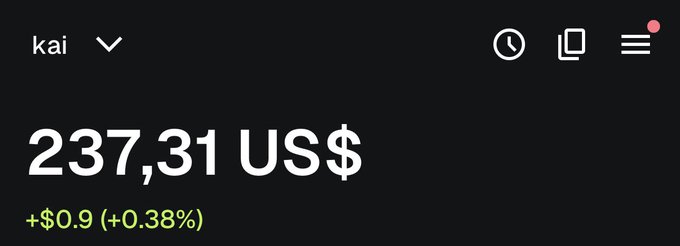 A dark financial app screen showing the ticker 'kai' with a price of '237,31 US$' and a positive change of '+$0.9 (+0.38%)' in green text.