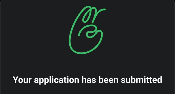 A black screen with a green outlined hand gesture logo and the text 'Your application has been submitted.'