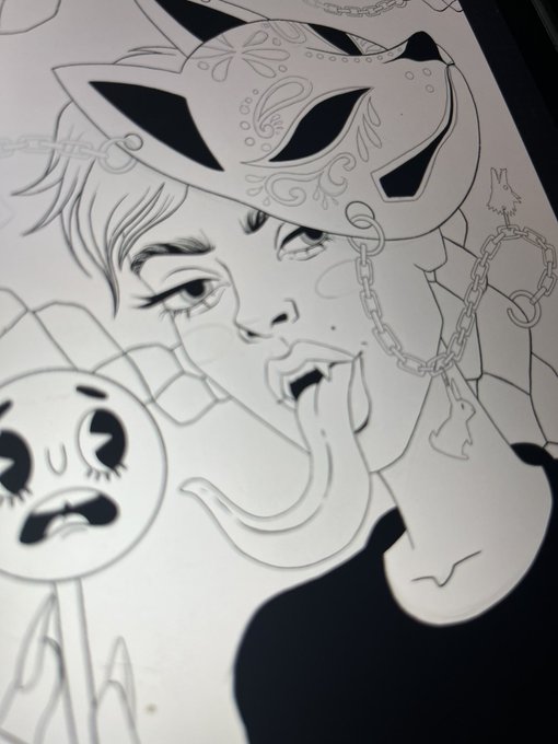 A black and white line art illustration showing a character wearing an ornate cat-eared mask, with a small cartoon ghost and chain details.