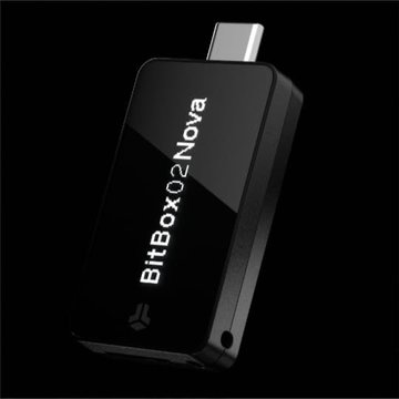 The BitBox02 Nova hardware wallet is shown on a black background, with the brand name "BitBox02 Nova" printed on its sleek, glossy casing, visually representing the device referenced in the security alert about hardware vulnerabilities.
