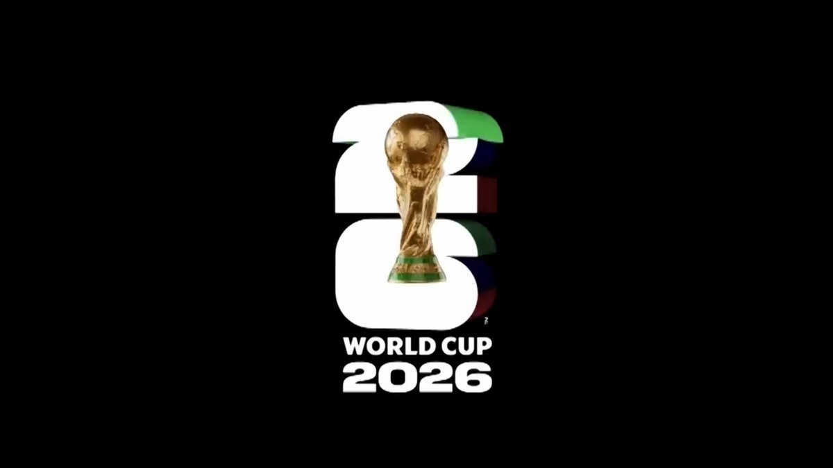 The image features a trophy with the World Cup logo on top of it. The trophy has a gold color and is placed against a black background. The text "World Cup 2026" is written below the trophy, indicating that this year's World Cup was held in Qatar. The caption at the bottom of the image reads: "i like this because it rewards the two things that actually matter: showing up and trading volume but also being good enough to end the month green most trading comps only care about who wins the leaderboard".