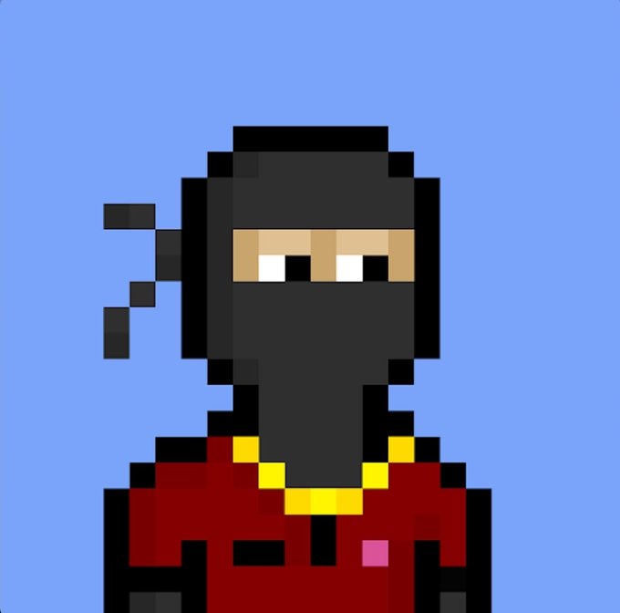 A pixel art illustration depicts a figure wearing a black balaclava with a tan eye-slit, a red shirt, and a thick gold chain, set against a solid light blue background.