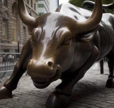 A bronze Charging Bull statue stands on a city street, symbolizing bullish market momentum — perfectly fitting the post's announcement that Bitcoin has entered the early stages of a new bull market, with 8 of 10 CryptoQuant indicators flashing bullish.