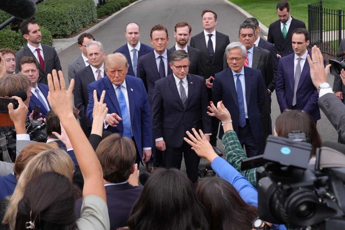 A cluster of congressional leaders and officials, including Donald Trump, are surrounded by a dense crowd of reporters holding up cameras and microphones during a press gaggle outside on a paved walkway. The image illustrates the post's caption about a "new record," likely referring to the unusually large number of media members covering the event.
