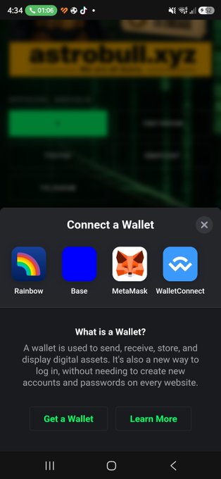 A smartphone screenshot of 'astrobull.xyz' showing a 'Connect a Wallet' prompt with options for Rainbow, Base, MetaMask, and WalletConnect.