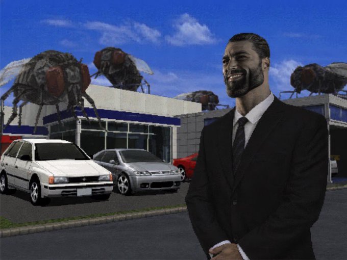 "The GIGA one", which stands for "Game Informed Graphics". This refers to a game that uses graphics as its primary medium, rather than traditional text-based storytelling. The image features a man dressed in a suit standing next to a car dealership with several cars on display and large flies hovering above the vehicles.
