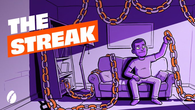 A cartoon man sits chained to a couch in purple hues, with the bold text "THE STREAK" displayed prominently, visually representing the campaign's theme of unbroken habits and lasting commitments. The chains wrapping around the room reinforce the idea of being "locked in" to a streak.
