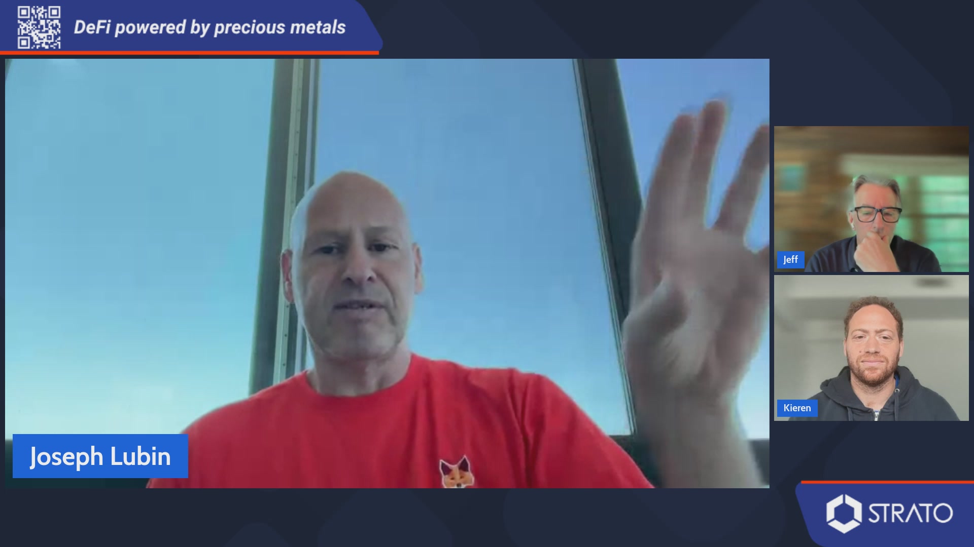 The image shows three people participating in an online video call using a webinar platform. The first person is wearing a red shirt and appears to be speaking into a microphone, while the other two individuals are also visible in the frame. They seem to be engaged in a discussion or presentation related to Ethereum technology. The background of the image features a blue sky with clouds, providing a serene atmosphere for their virtual meeting.