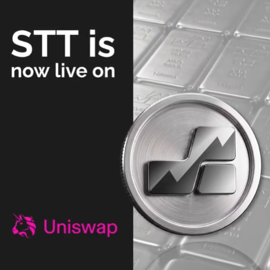 Announcement graphic stating 'STT is now live on Uniswap' featuring a silver cryptocurrency coin with the STT logo on a textured silver background.