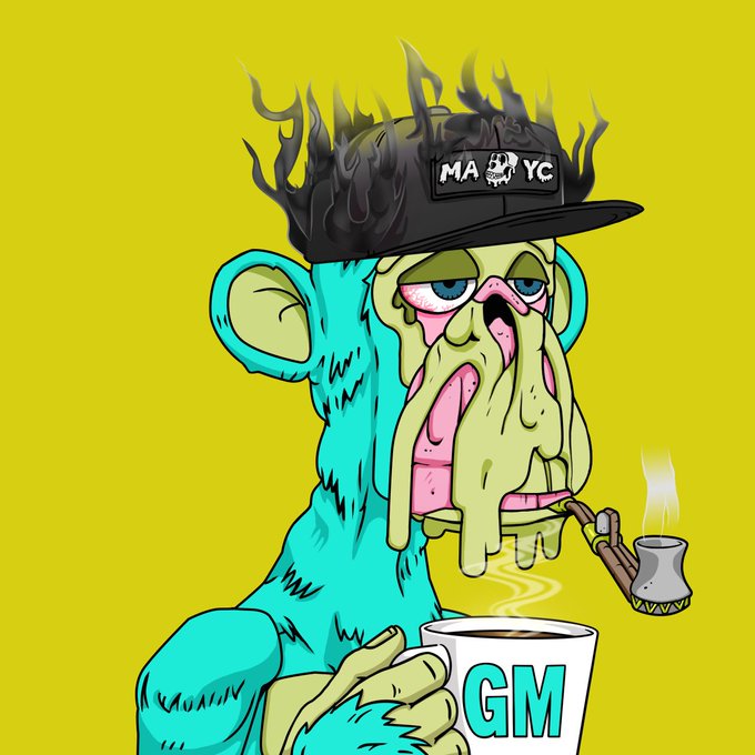 The image features a cartoon monkey with a cup of coffee, wearing a hat that has flames coming out of it. The monkey appears to be holding the cup of coffee while smoking a pipe. The caption "Happy mutant Monday" is written below the image.