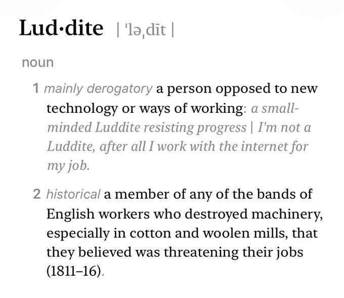 A dictionary definition of the noun 'Lud·dite' (\'ləˌdīt\), shown as 1) mainly derogatory, a person opposed to new technology, and 2) historical, a member of English bands of workers who destroyed machinery in 1811–16.