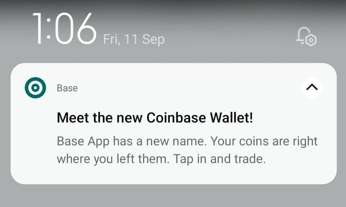 A phone lock screen showing the time '1:06' on 'Fri, 11 Sep' with a notification from the 'Base' app announcing 'Meet the new Coinbase Wallet!'.