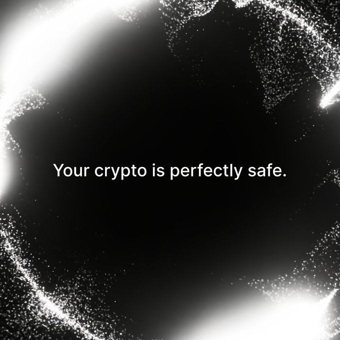 A dark image with white specks forming a border and the text 'Your crypto is perfectly safe.' centered on a black background.