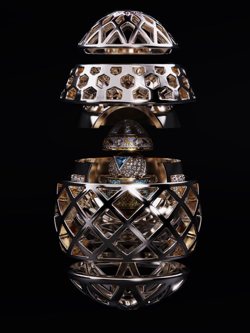 A 3D rendered ornate golden and silver orb with intricate geometric lattice patterns against a black background.
