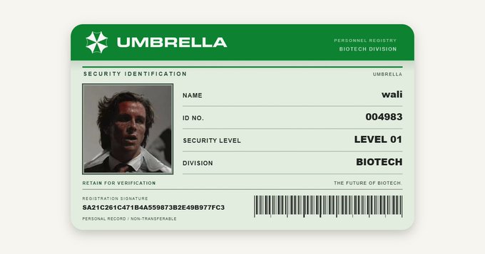 A green and white ID badge for "UMBRELLA" Personnel Registry, Biotech Division, with the name "wali", ID No. "004983", Security Level "LEVEL 01", Division "BIOTECH", featuring a photo of a man.