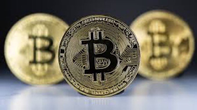 The image shows three physical Bitcoin tokens with the characteristic "₿" symbol prominently displayed on the center coin, with the inscription "BITCOIN DIGITAL DECENTRALIZED PEER TO PEER" visible along its edge. This visual directly relates to the accompanying post, which lists the top 10 Turkish cities leading Bitcoin mining or production, predominantly from southeastern regions like Diyarbakır, Şanlıurfa, and Şırnak.