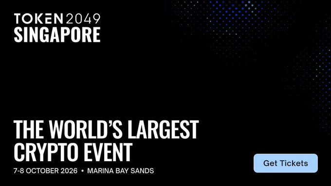 A promotional banner for Token2049 Singapore, billed as "The World's Largest Crypto Event," taking place 7-8 October 2026 at Marina Bay Sands, with a "Get Tickets" button. The image aligns with the post announcing the user's plans to attend the conference.