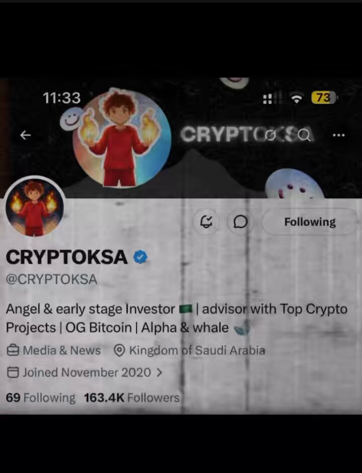 The image shows a social media post from a user named @CRYPTOKSA, which has been shared by another user. The post features a cartoon character wearing a red shirt with a smiley face and the words "CryptoTOSA" written on it. The post also includes a link to a website called "www.cryptotosa.com". The image is accompanied by a caption that reads "@CRYPTOKSA متعوب عليه", which translates to "@CRYPTOKSA @ Cryptotosa" in English, and it also mentions the user's name as "@CRYPTOKSA".