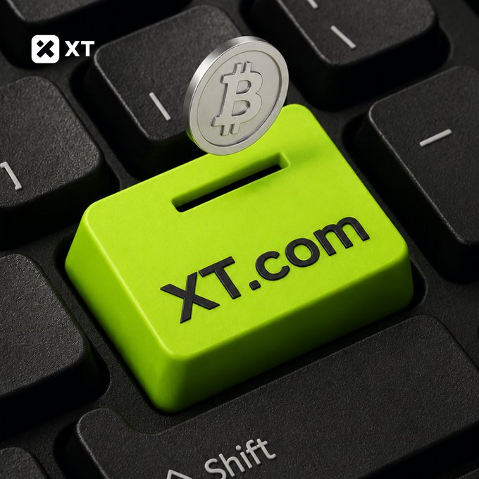 A silver Bitcoin coin is shown being inserted into a bright green keyboard key labeled "XT.com," symbolizing the simple start of a crypto trading journey. Surrounded by standard black keys and a "Shift" key, the image visually reinforces the post's message that entering the crypto market with XT.com begins with just a single click.