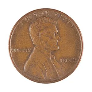 A close-up image of the obverse side of a 1918 Lincoln wheat penny, showing the profile of Abraham Lincoln and the inscriptions 'IN GOD WE TRUST' and 'LIBERTY'.