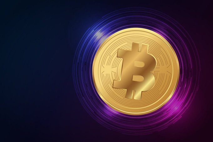 A digital rendering of a gold Bitcoin coin against a dark background with swirling purple and blue light effects.