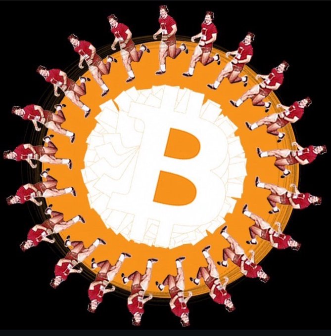 A circular kaleidoscopic design featuring the Bitcoin 'B' logo in the center on an orange and white background, surrounded by repeated images of a man in a red shirt and brown shorts arranged in a rotating pattern against a black background.