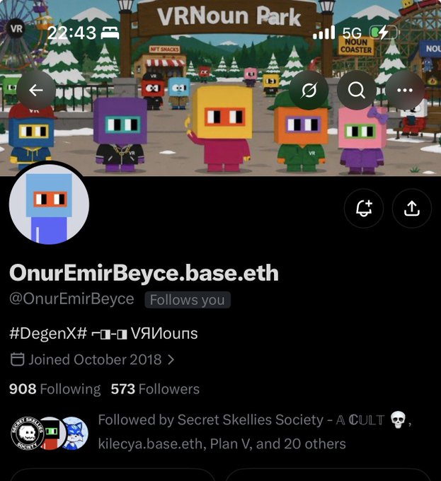A Twitter/X profile screenshot for @OnurEmirBeyce (OnurEmirBeyce.base.eth), showing a VRNoun Park header with blocky VR avatar characters, and the bio reading '#DegenX# 🤖👾 VRNouns', with 908 Following and 573 Followers.