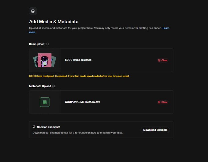 A dark-themed OpenSea upload interface titled "Add Media & Metadata" showing 6,000 items selected for the XCOPUNKS collection, with a corresponding XCOPUNKSmetadata.csv file ready for upload. The page includes a "Download Example" button for reference, directly supporting the tweet's announcement of uploading file and metadata for the XCOPUNKS NFT collection.