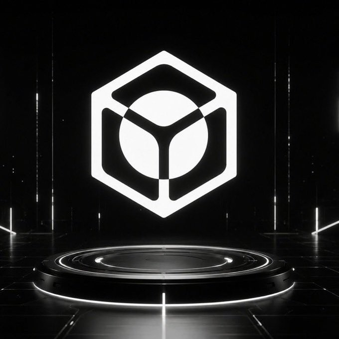 A glowing white hexagonal logo featuring a stylized sphere and geometric design hovers above a circular, futuristic platform illuminated by neon accents against a dark background, representing the emerging brand identity of @NucleusCodes as the post hints at its quiet but promising developments.