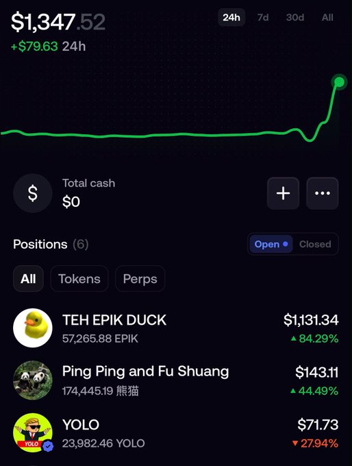 The screenshot shows a trading portfolio with a total value of $1,347.52, including a position in "TEH EPIK DUCK" worth $1,131.34, which has gained 84.29%. This visually confirms the post's claim of being back up to $1350.
