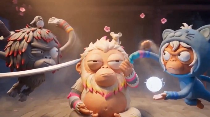 Three stylized 3D animated monkeys, each wearing colorful armbands and accessories, are posed together as if meditating or engaged in a fight, with one holding a glowing orb and a small mouse on its head.