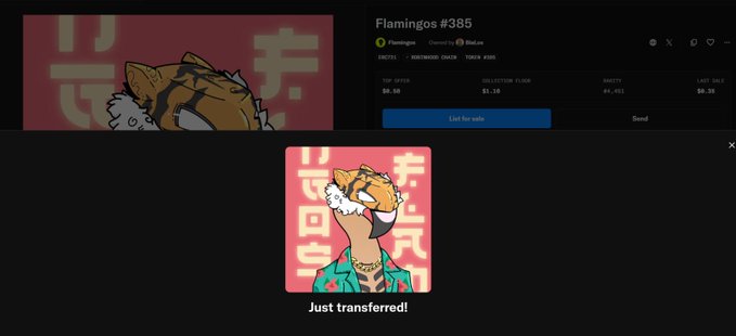 An NFT marketplace interface for 'Flamingos #385' owned by elinukas, showing a pixel-art flamingo character with a 'Just transferred!' confirmation.