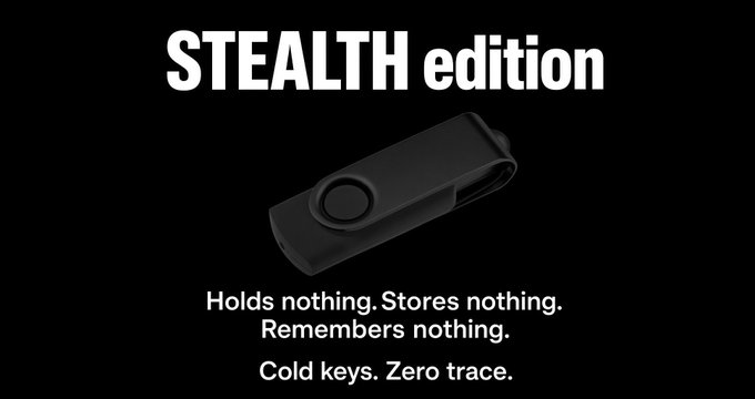 A product image with text 'STEALTH edition' advertising a black USB flash drive that 'Holds nothing. Stores nothing. Remembers nothing. Cold keys. Zero trace.'