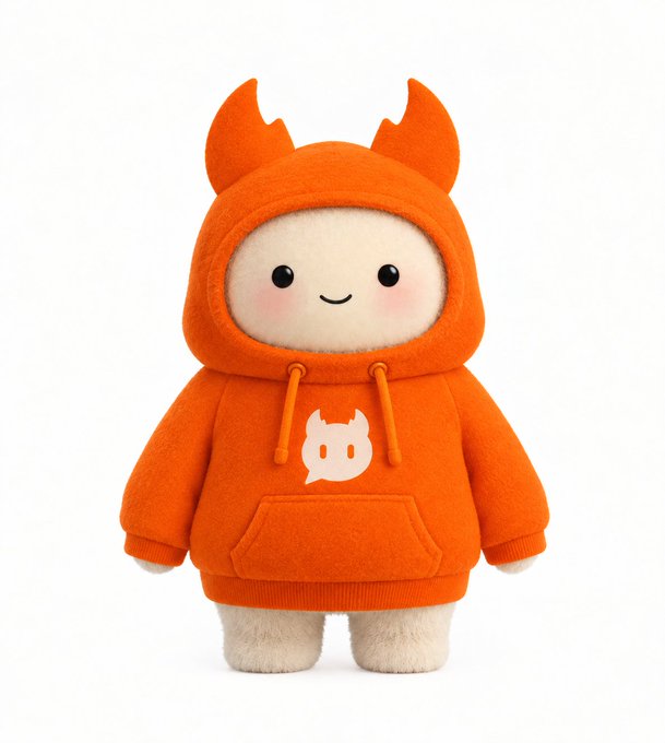 An adorable plush toy character wearing an orange hoodie with devil horns on the hood and a small white mascot logo on the chest, featuring a smiling face with pink cheeks.
