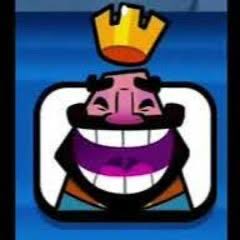 A cartoon icon featuring a purple-faced character with a wide grin, dark mustache, and a yellow crown on its head, set against a blue background.