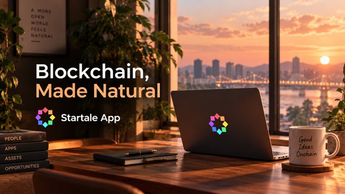 The image shows a sunset workspace scene with a laptop displaying the Startale App logo (a colorful hexagonal design), accompanied by the text "Blockchain, Made Natural" alongside "Startale App." A coffee mug reads "Good Ideas Onchain," and a framed sign on the wall says "A MORE OPEN WORLD FEELS NATURAL," while sidebar tabs list "PEOPLE," "APPS," "ASSETS," and "OPPORTUNITIES." The warm, natural setting visually reinforces the post's message about making blockchain technology feel seamless and invisible, just like the effortless atmosphere of a comfortable work environment.