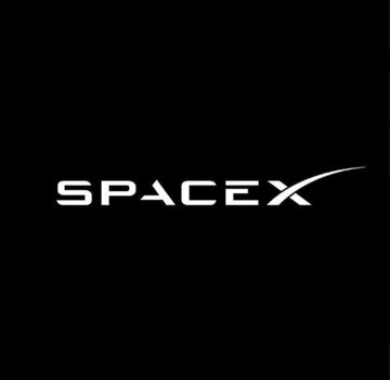 urn of white and black text reading "SPACEX" against a black background.
