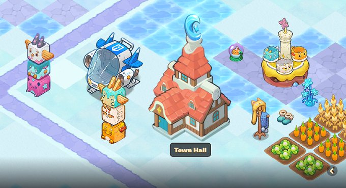 A screenshot from a colorful mobile farming/city-building game showing a 'Town Hall', various animal-themed characters, crop fields with pumpkins and cabbages, and decorative items on a pastel-tiled landscape.