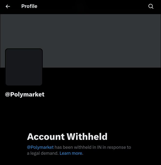 A dark-mode X profile page for @Polymarket displays the notice “Account Withheld,” stating that “@Polymarket has been withheld in IN in response to a legal demand. Learn more.”